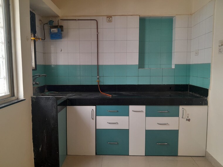 Kitchen, ram-india-green-divine 2 Bedroom 810 Sq.Ft. Apartment In Hadapsar Pune 9474178