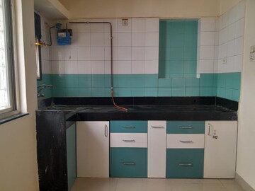 Kitchen in 2 BHK Apartment at Ram India Green Divine, Hadapsar – for Rent