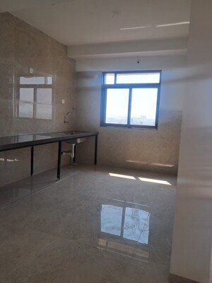 Kitchen in 2 BHK Apartment at Shekhar NB Towers, Moshi – for Rent