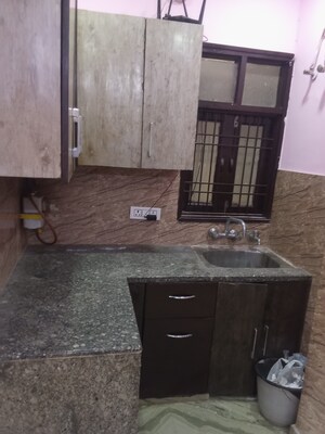 Kitchen in 2 BHK Apartment at Rohini Sector 25 – for Rent
