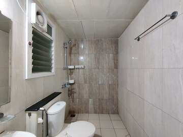 Bathroom in 3 BHK Apartment at Mantri Webcity, Hennur – for Rent