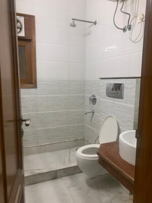 Bathroom in 3 BHK Builder Floor at Nehru Enclave – for Rent