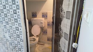 Bathroom in 4 BHK Independent House at Mohan Garden – for Sale