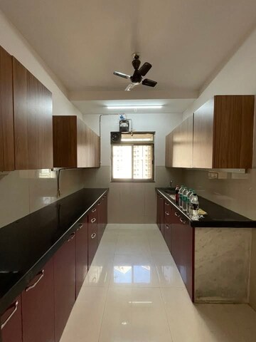 Kitchen in 1 BHK Apartment at National Trinity Paradise, Shilphata – for Sale