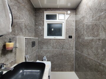 Bathroom in 4 BHK Apartment at Bhartiya Nikoo Homes Phase 2, Thanisandra Main Road – for Rent