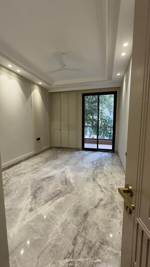 Bedroom in 4 BHK Builder Floor at Safdarjung Enclave – for Sale
