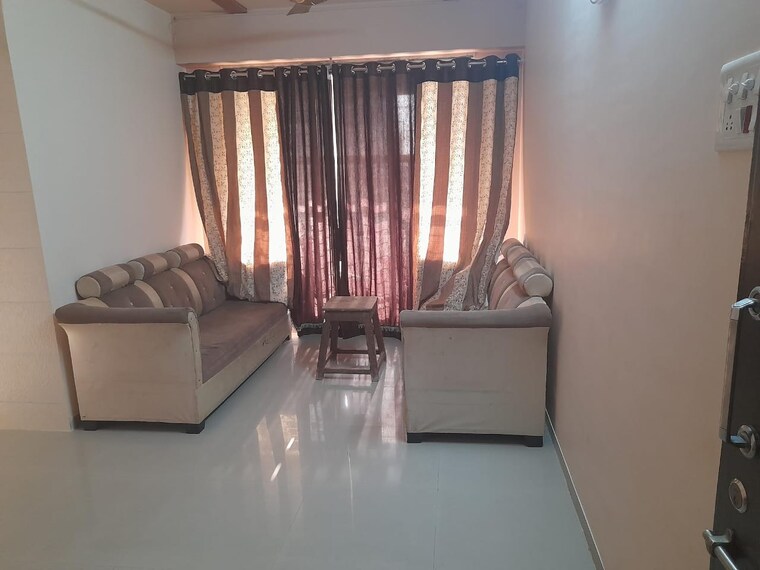 Living Room, charms-city 2 Bedroom 671 Sq.Ft. Apartment In Titwala Thane 9474661