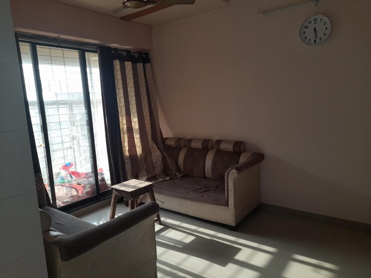 Living Room, charms-city 2 Bedroom 671 Sq.Ft. Apartment In Titwala Thane 9474661