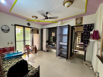 Living Room in 1 BHK Apartment at Charms Paradise, Titwala – for Sale