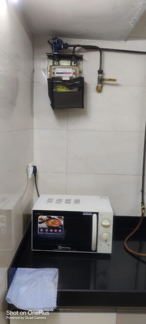 Kitchen in 2 BHK Apartment at Satellite Garden, Goregaon East – for Sale