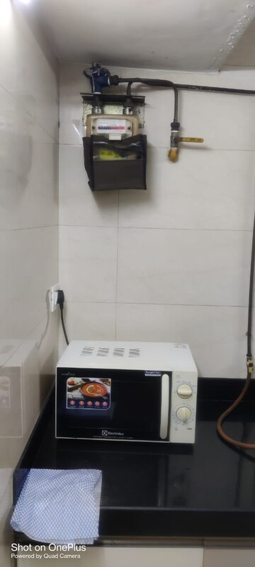 Kitchen in 2 BHK Apartment at Satellite Garden, Goregaon East – for Sale