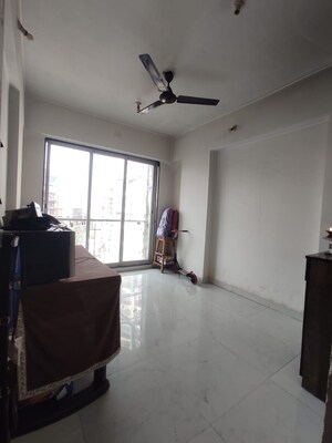 Living Room in 1 BHK Apartment at Mahim West – for Sale