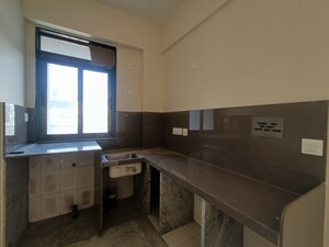 Kitchen in 2 BHK Apartment at Marine Lines – for Sale