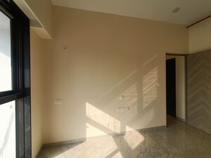 Room in 2 BHK Apartment at Marine Lines – for Sale