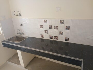 Kitchen in 2.5 BHK Apartment at Eureka Diya Green City, Raj Nagar Extension – for Sale