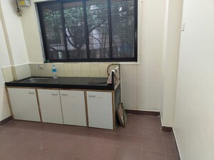 Kitchen in 1 RK Apartment at Satyam CHS Naupada, Naupada – for Rent