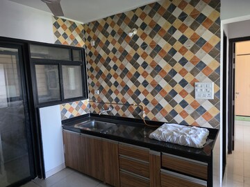 Kitchen in 3 BHK Apartment at Sargam CHS Nanded, Sinhagad Road – for Sale