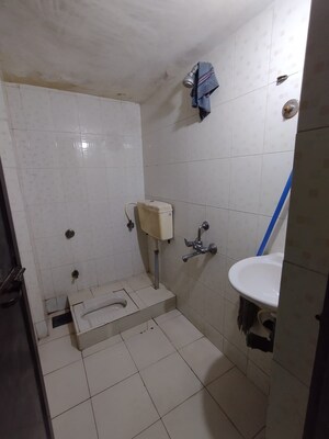 Bathroom in 1 BHK Apartment at Krishna Greenland Park Vastu Federation, Ghodbunder Road – for Sale