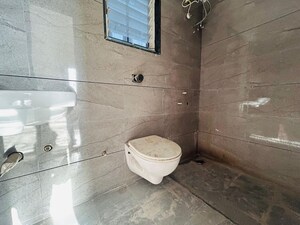 Bathroom in 2 BHK Apartment at Nirmal Krushnai Kunj, Vadgaon Budruk – for Sale