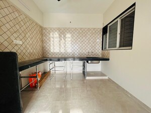 Kitchen in 2 BHK Apartment at Nirmal Krushnai Kunj, Vadgaon Budruk – for Sale