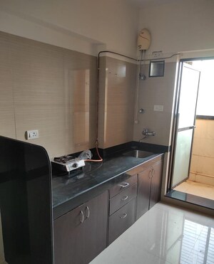 Kitchen in 1 BHK Apartment at K Raheja Heights, Malad East – for Rent