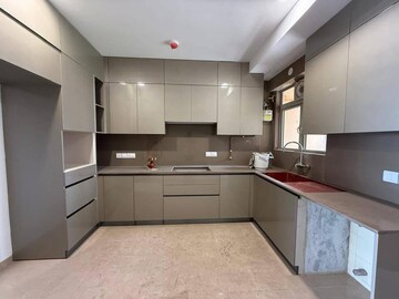 Kitchen in 4 BHK Apartment at Hiranandani Estate Rodas Enclave, Ghodbunder Road – for Rent