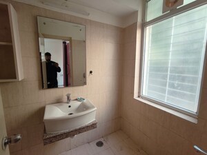Bathroom in 3 BHK Apartment at Orchid Island, Sector 51 – for Rent