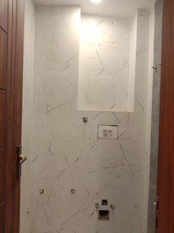 Bathroom in 3 BHK Builder Floor at Dwarka Mor – for Sale