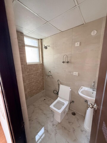 Bathroom in 2 BHK Apartment at Ansal Royal Heritage, Sector 70 – for Rent