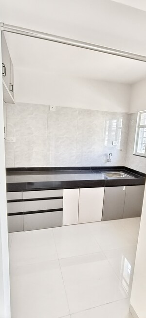 Kitchen in 2 BHK Apartment at Sankalp Shanti Anand, Wadgaon Sheri – for Rent
