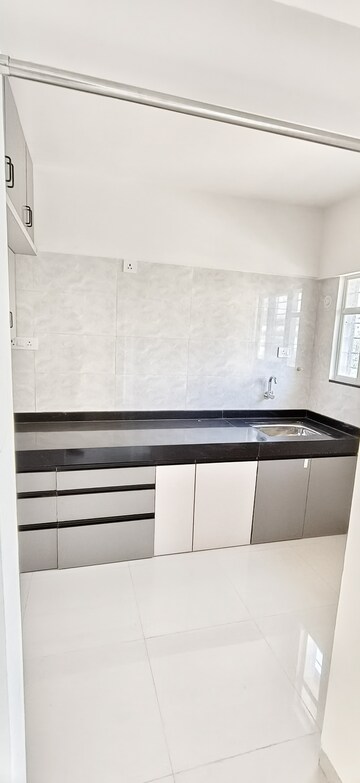 Kitchen in 2 BHK Apartment at Sankalp Shanti Anand, Wadgaon Sheri – for Rent