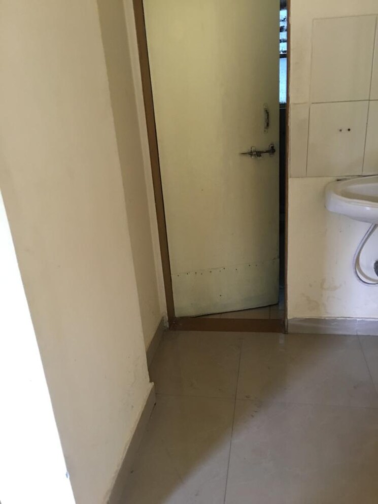 Bathroom, varuna-residency-apartment 2 Bedroom 950 Sq.Ft. Apartment In Pimple Saudagar Pune 9476646