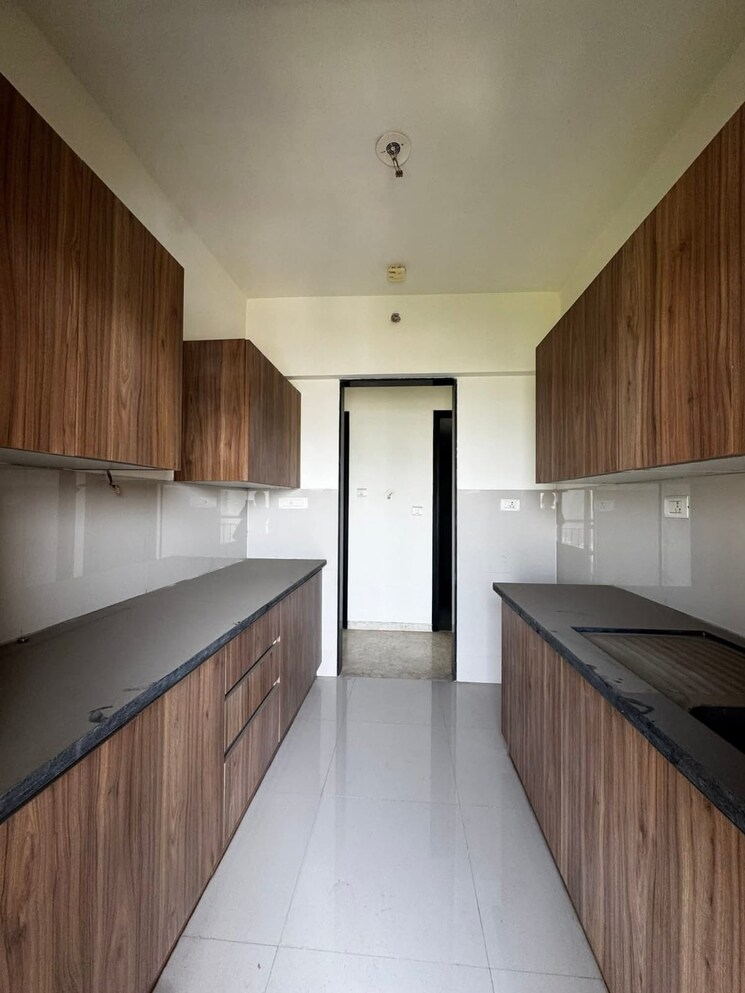 Kitchen, provident-palmvista 2 Bedroom 637 Sq.Ft. Apartment In Daighar Gaon Thane 9476653