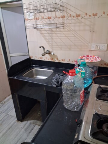 Kitchen in 1 BHK Apartment at Kakad West End, Andheri West – for Rent