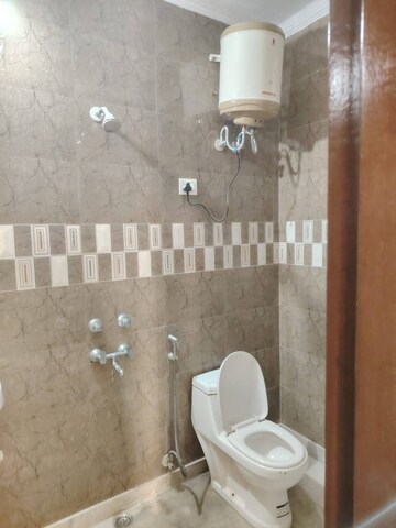 Bathroom in 1 BHK Builder Floor at Chattarpur – for Rent