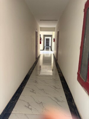 Building Lobby in 2 BHK Apartment at Sushant Golf City – for Sale