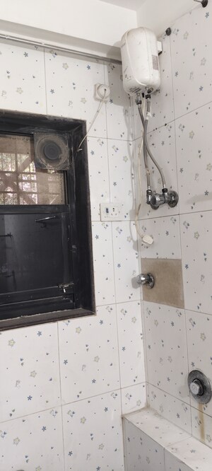 Bathroom in 3 BHK Apartment at Ajmera Golden Rays, Andheri West – for Sale