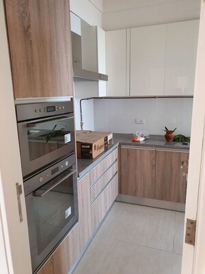 Kitchen in 3 BHK Apartment at DLF The Primus, Sector 82a – for Sale