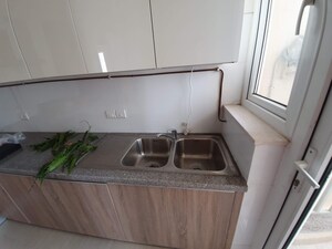 Kitchen in 3 BHK Apartment at DLF The Primus, Sector 82a – for Sale