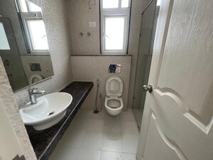 Bathroom in 2 BHK Apartment at Chandra Panorama, Sushant Golf City – for Rent