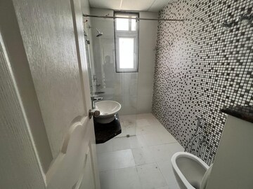 Bathroom in 2 BHK Apartment at Chandra Panorama, Sushant Golf City – for Rent