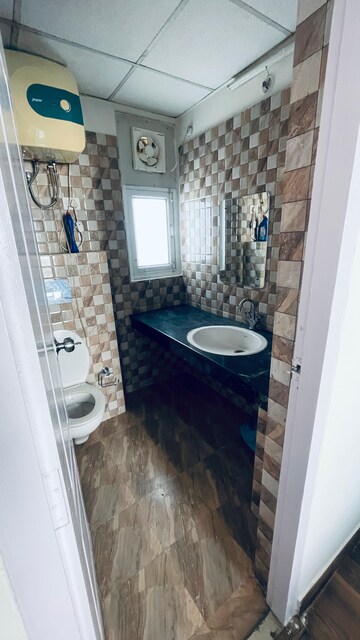 Bathroom in 3 BHK Apartment at Omaxe The Palace, Gomti Nagar – for Rent