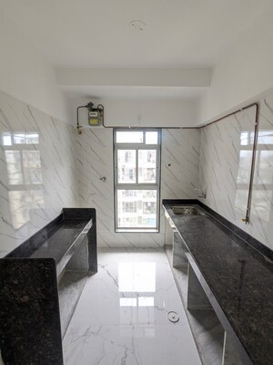 Kitchen in 1 BHK Apartment at Dharti Pressidio, Kandivali West – for Sale