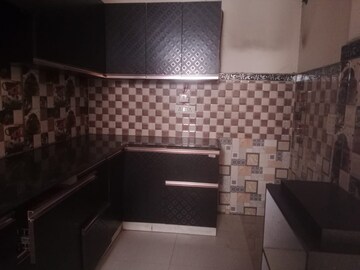 Kitchen in 4 BHK Apartment at Ramprastha Coral Heights, Ramprastha Greens – for Rent