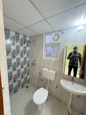 Bathroom in 3 BHK Builder Floor at Mohan Garden – for Sale