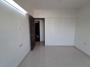 Room in 2 BHK Apartment at PR Wood Wind, Andheri East – for Rent