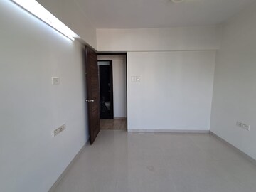 Room in 2 BHK Apartment at PR Wood Wind, Andheri East – for Rent