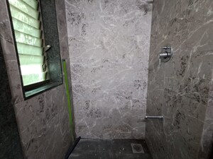 Bathroom in 2 BHK Apartment at PR Wood Wind, Andheri East – for Rent