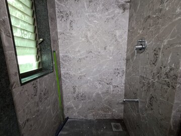 Bathroom in 2 BHK Apartment at PR Wood Wind, Andheri East – for Rent