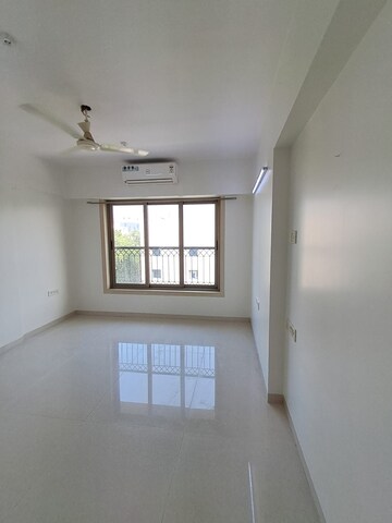 Room in 2 BHK Apartment at PR Wood Wind, Andheri East – for Rent